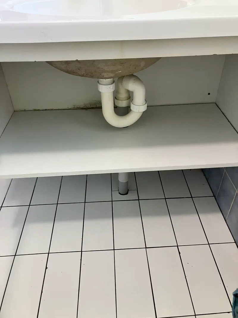Vanity interior and square floor tiles in the after record